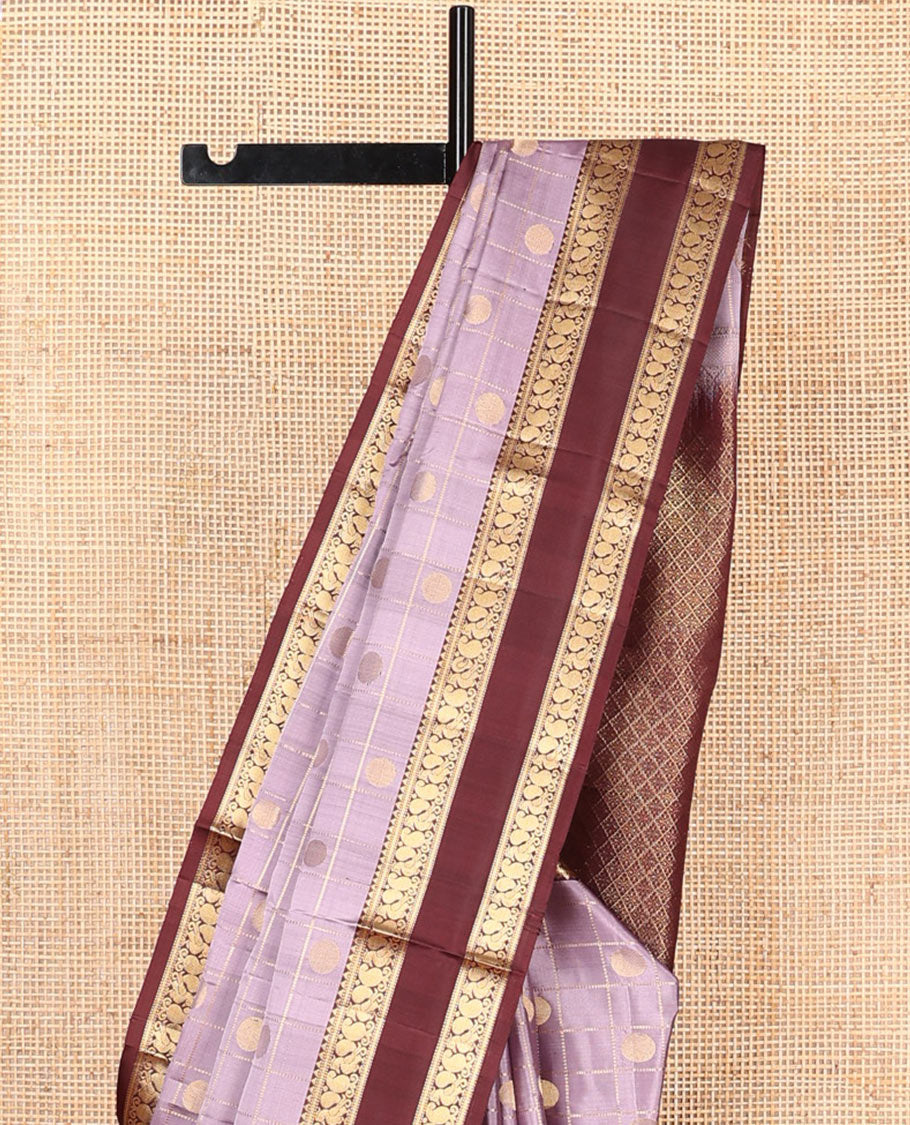 Lavender rudraksham butta enclosed checked soft silk saree, contrast rettai pettu border of rekku, muthu, banaras, and mayil designs, and jaal pallu