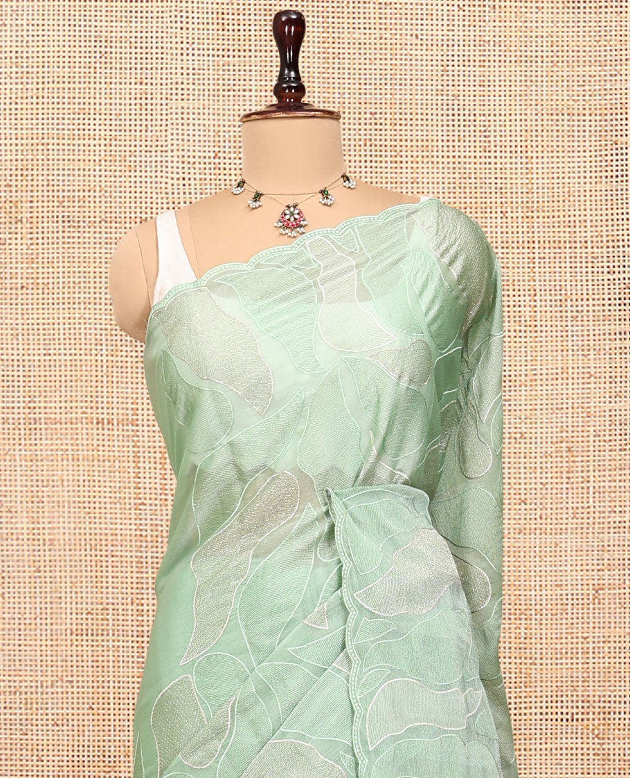 Pista Green Organza Saree, Subtly Enriched with Abstract-Style Embroidery, a Scallop Border, and a Matching Blouse