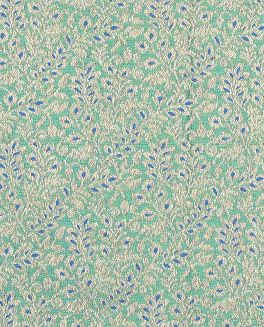 Green pure-silk half saree, jacquard with contrast traditional zari bordered skirt, blouse of thilakam, muthu, mayil kann,  kodi visiry, and kamalam motifs, and zari design dhavani