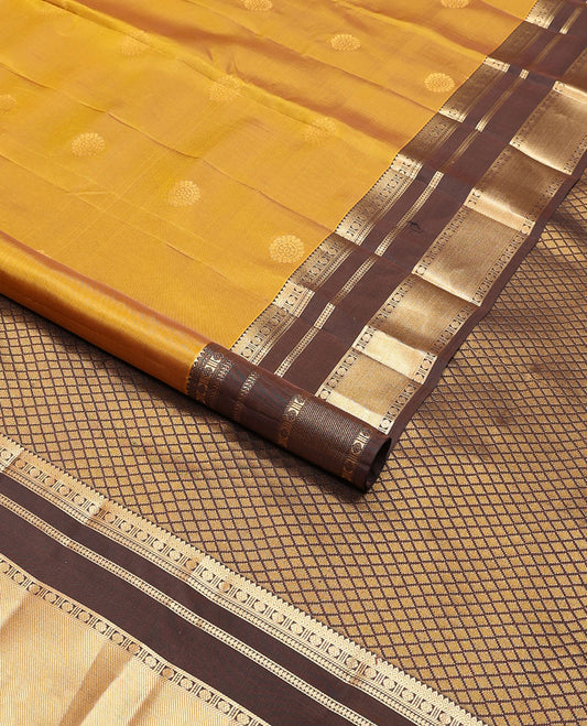 Mustard floral buttas vasundhara elite silk saree with contrast intricate zari design border & argyle design pallu