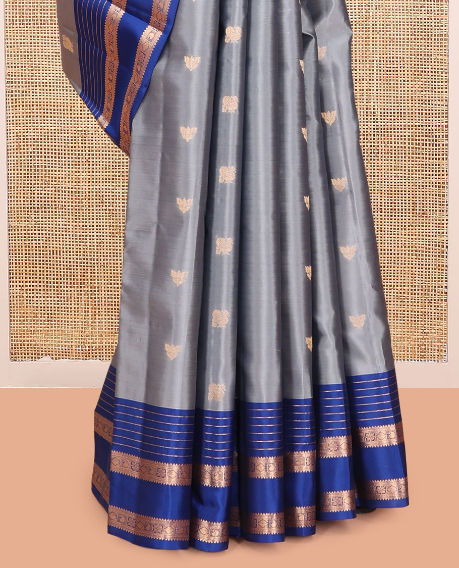 Grey Vasundhara Lite Silk Mix Saree, Ornamented with Zari Buttas, a Contrast Rettai Pettu Border of Rekku, Muthu, Diamond, and Manga Designs, Manga Pallu, and a Contrast Blouse