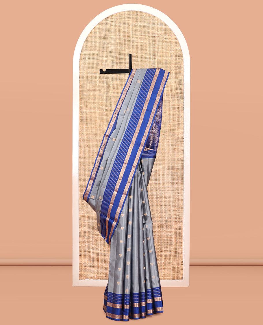 Grey Vasundhara Lite Silk Mix Saree, Ornamented with Zari Buttas, a Contrast Rettai Pettu Border of Rekku, Muthu, Diamond, and Manga Designs, Manga Pallu, and a Contrast Blouse