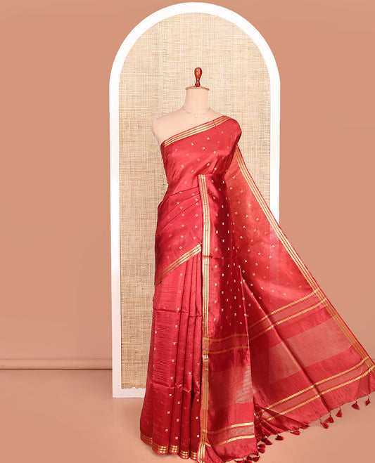 Candy Red Banana Pith Saree Mesmerized with Square-Shaped Zari Buttas, Subtly Woven Zari Piping Border, Pallu Gleamed Up with Zari Stripes, and Paired with a Matching Blouse