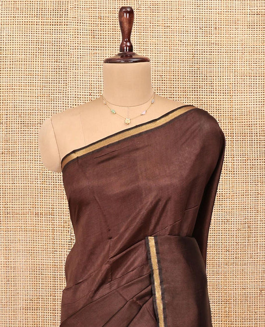 Brown Plain Banana Pith Saree, Subtle Piping Border, Pallu Steeped with Stripes, and Paired with a Matching Blouse
