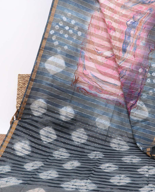 Multi-color abstract printed linen cotton saree, contrast striped border & shibori motifs printed pallu