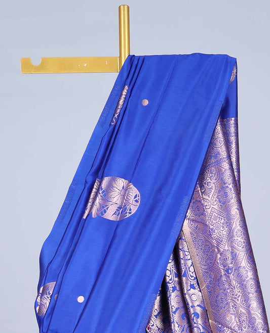 Borderless blue butter silk saree with zari buttas, zari-rich intricately designed pallu