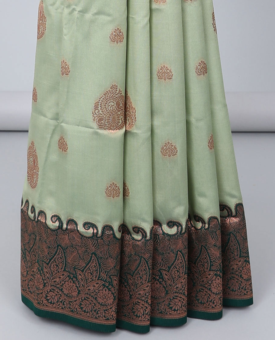 Green butter silk saree with zari buttas, contrast zari border of floral designs & pallu of intricate designs
