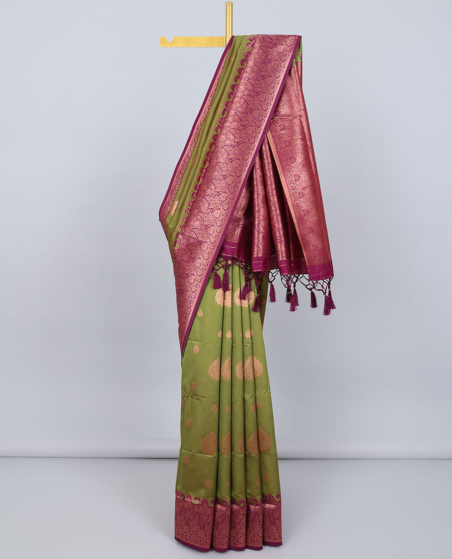 Green butter silk saree with zari buttas, contrast zari border of floral designs & pallu of intricate designs