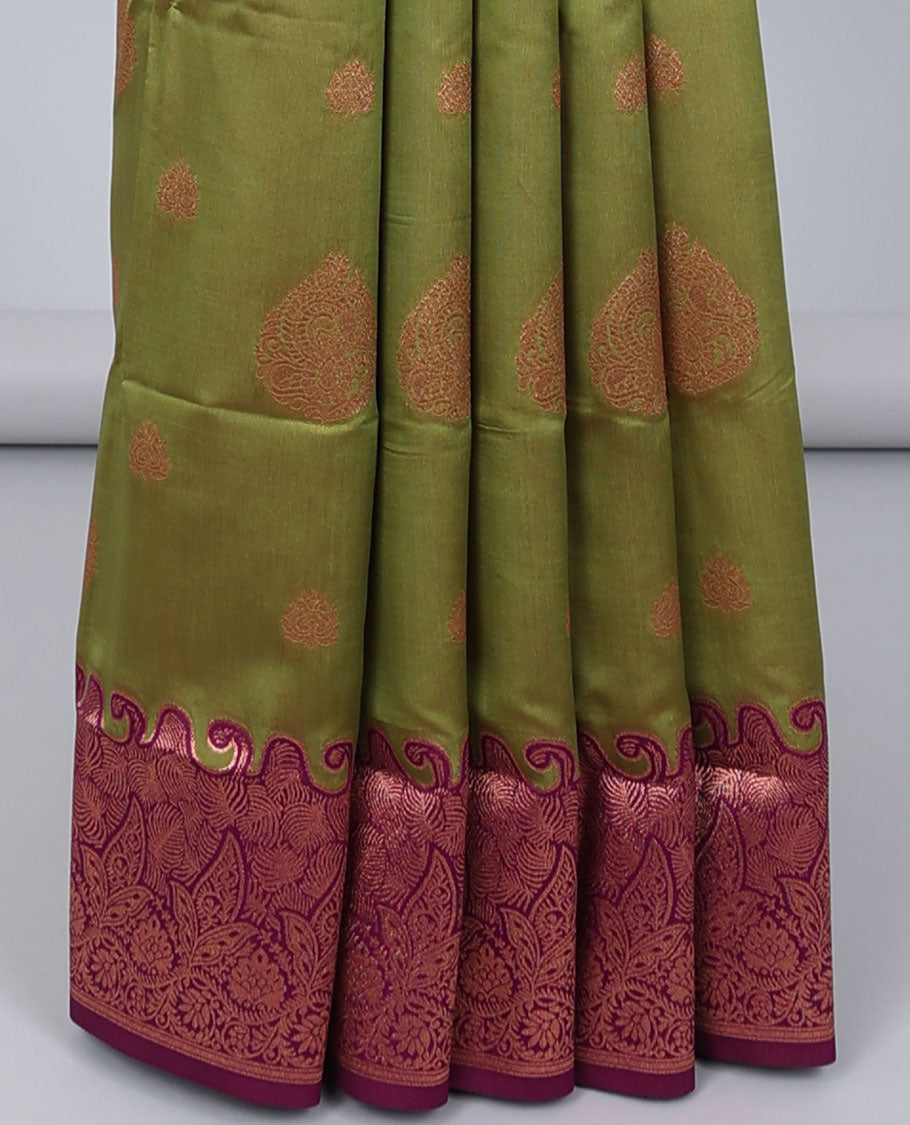 Green butter silk saree with zari buttas, contrast zari border of floral designs & pallu of intricate designs