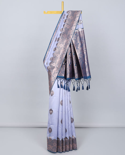 Light lavender butter silk saree with zari buttas, contrast zari border of paisley & floral creeper & intricate pallu