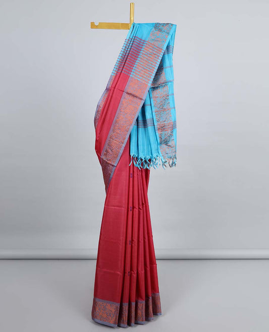 Maroon banana pith saree with buttas, contrast animal motifs border & pallu of stripes