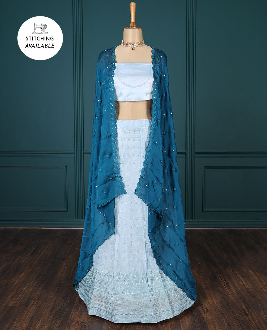 Blue embroidered half-saree, embroidered patch border, embroidered blouse & contrast scallop embroidered dhavani