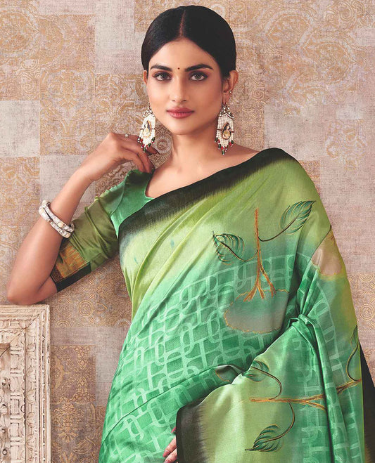 Green floral motifs & geometric patterned saree, floral design border & pallu of intricate designs