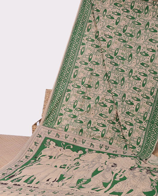 Green geometric machine printed kalamkari cotton saree, diamond border & pallu of pichwai cow & radha krishnan motifs