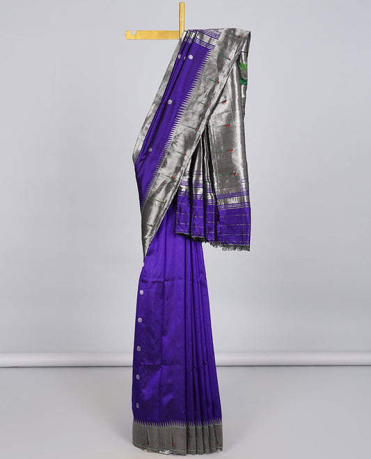 Blue paithani silk saree with flower zari buttas, contrast vidarbha muniya border & pallu of colorful floral vine & bird