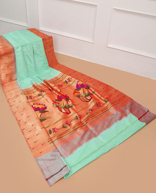 Green paithani silk saree with zari buttas, contrast vidarbha triple muniya border & pallu of colorful floral designs