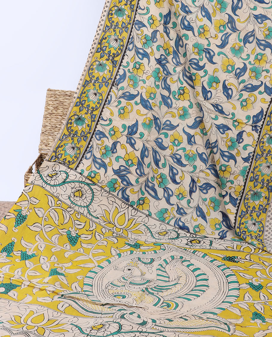 Multi-color floral vine machine-printed kalamkari cotton saree, contrast floral creeper border & peacock pallu