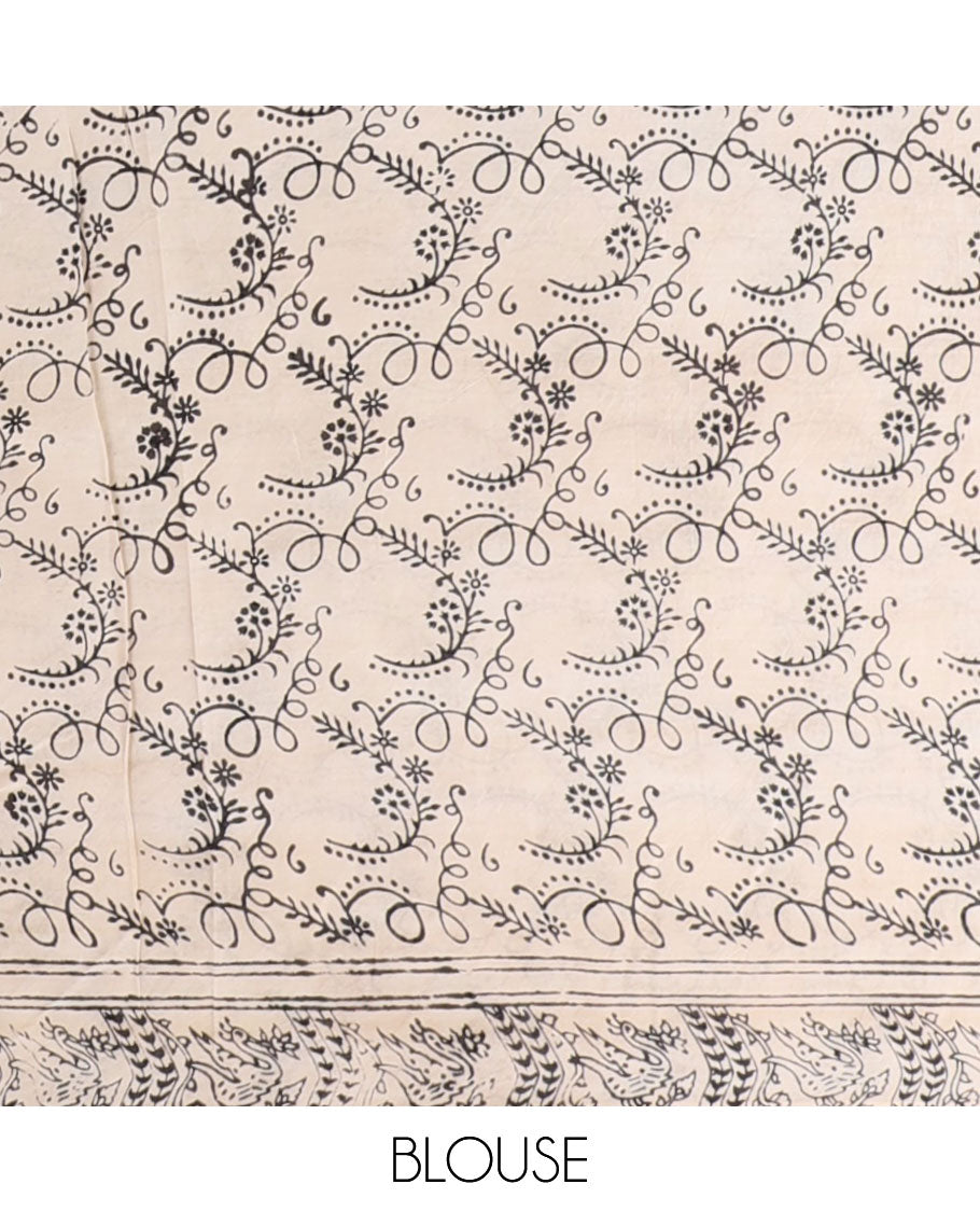 Multi-color floral vine machine-printed kalamkari cotton saree, contrast floral creeper border & peacock pallu