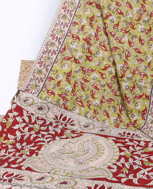 Green floral vine machine-printed kalamkari cotton saree, contrast floral creeper border & pallu of floral & peacock
