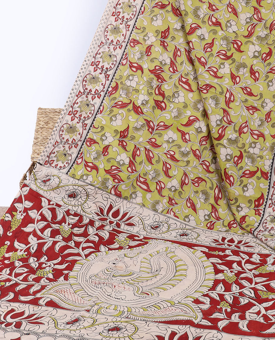 Green floral vine machine-printed kalamkari cotton saree, contrast floral creeper border & pallu of floral & peacock