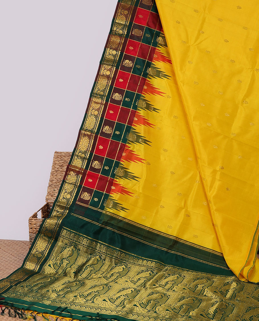 Yellow zari buttas kancheepuram silksaree, contrast intricate pallu & temple checked border of salngai & kamalam design