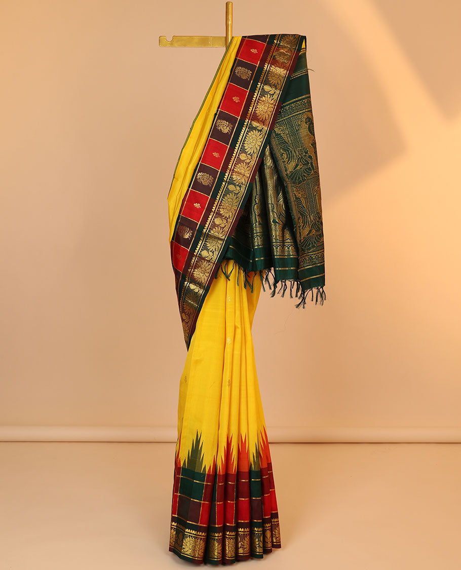 Yellow zari buttas kancheepuram silksaree, contrast intricate pallu & temple checked border of salngai & kamalam design