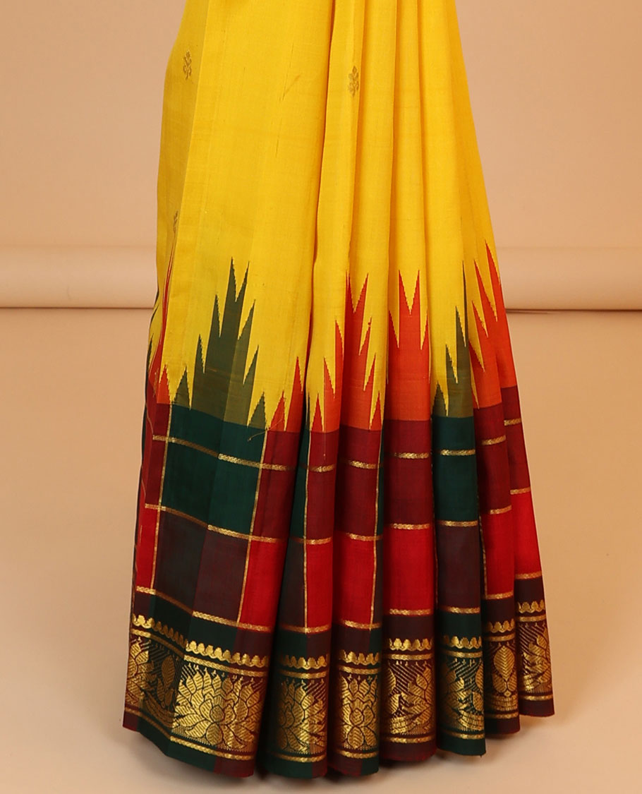 Yellow zari buttas kancheepuram silksaree, contrast intricate pallu & temple checked border of salngai & kamalam design