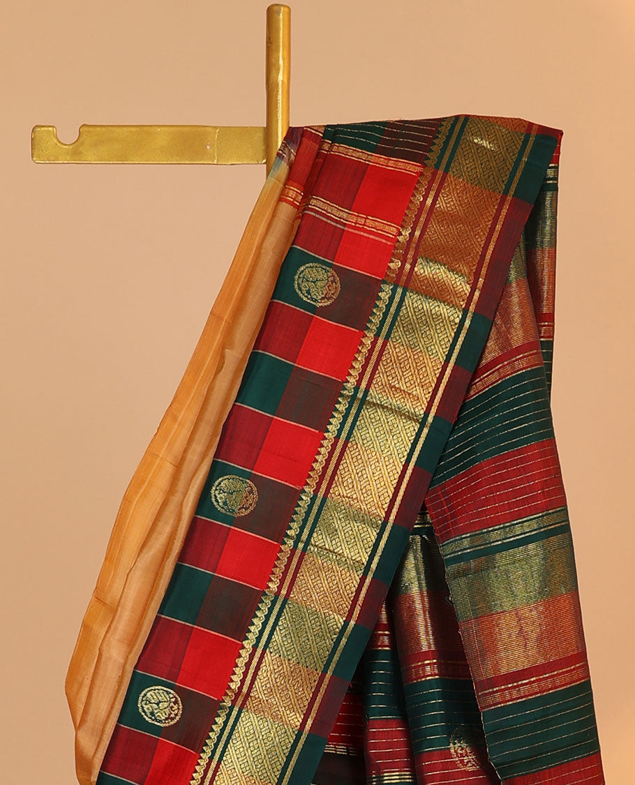 Orange buttas kancheepuram silksaree, contrast intricate zari pallu & checked temple border of thilakam mokku & banaras