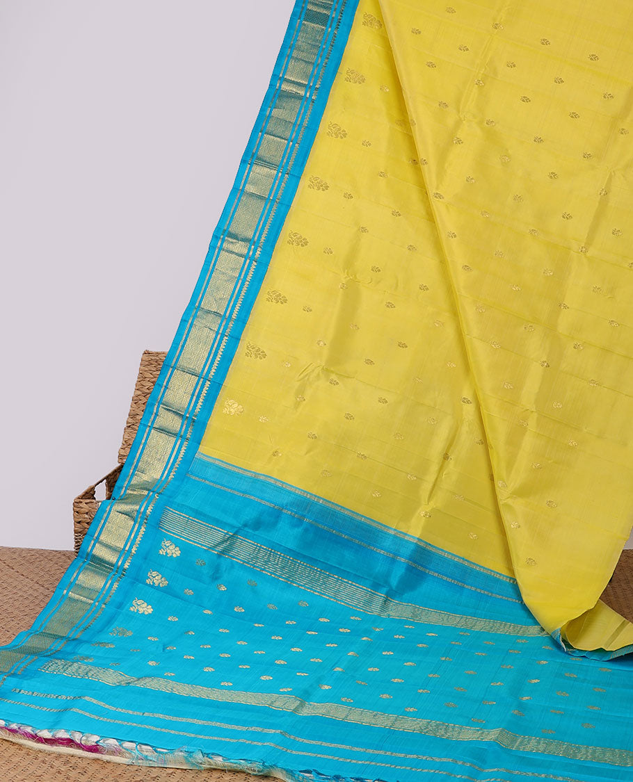 Yellow buttas kancheepuram silksaree, contrast zari design pallu & korvai border of thilakam mokku,banaras & jaal