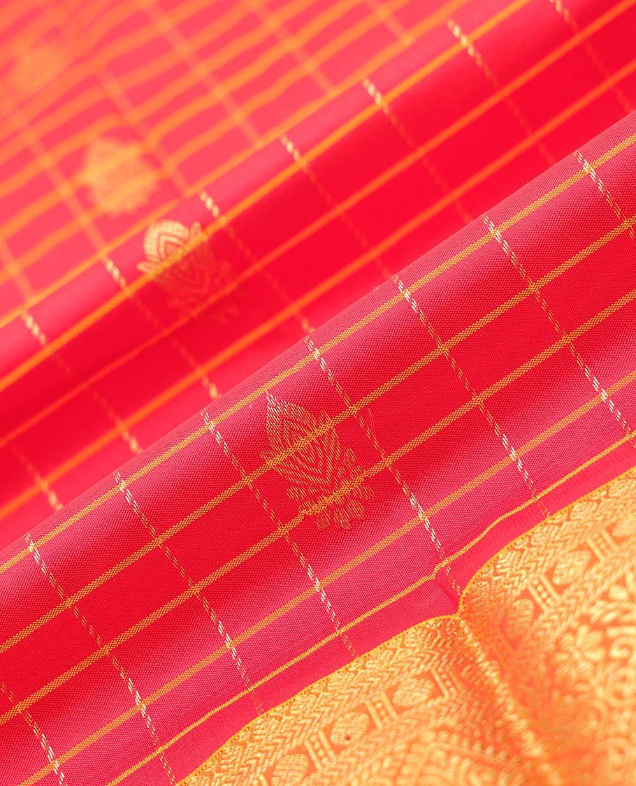 Red checked & zari buttas navarathna pavadai material, contrast striped blouse & traditional zari design border