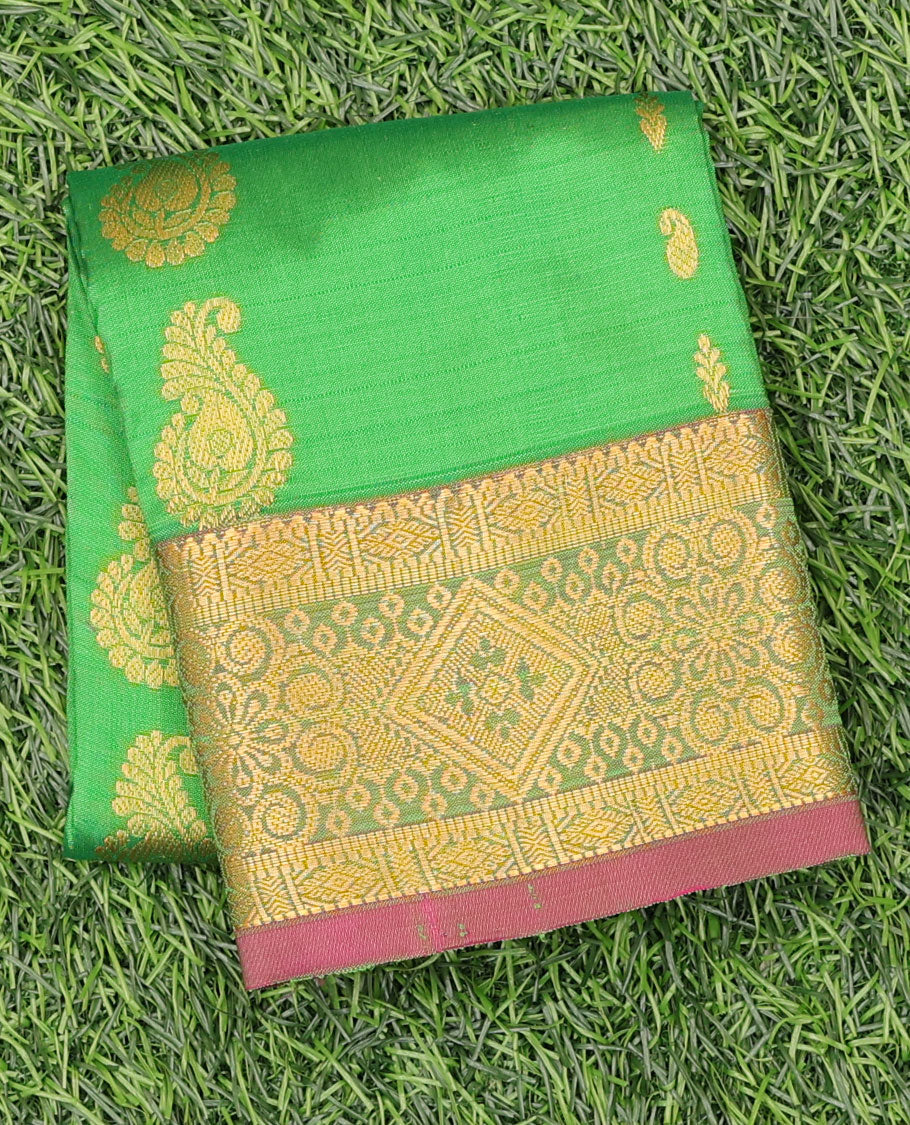 Green zari buttas navarathna pavadai material, contrast traditional design border & zari design blouse