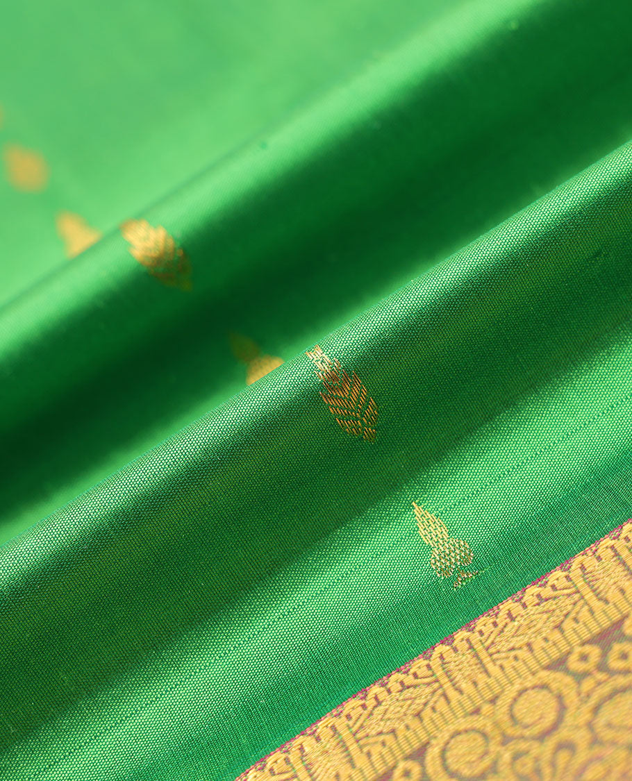 Green zari buttas navarathna pavadai material, contrast traditional design border & zari design blouse