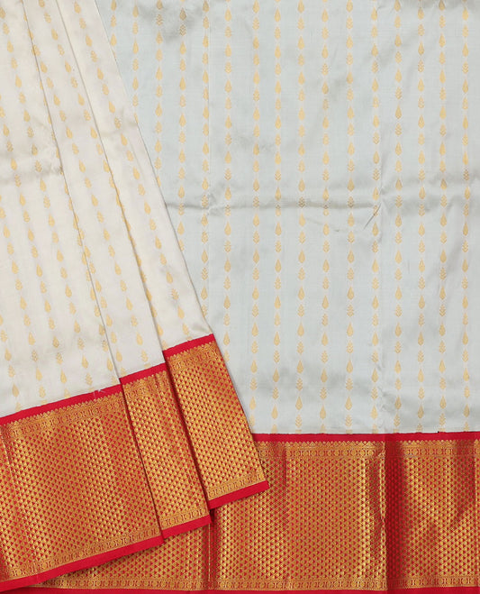 Cream zari design navarathna pavadai material, contrast blouse & border of traditional zari designs