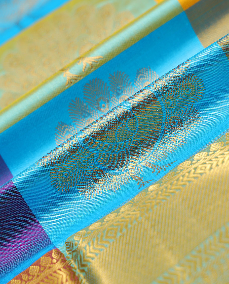 Multi-color checked & zari buttas navarathna pavadai material, contrast blouse & border of traditional zari designs