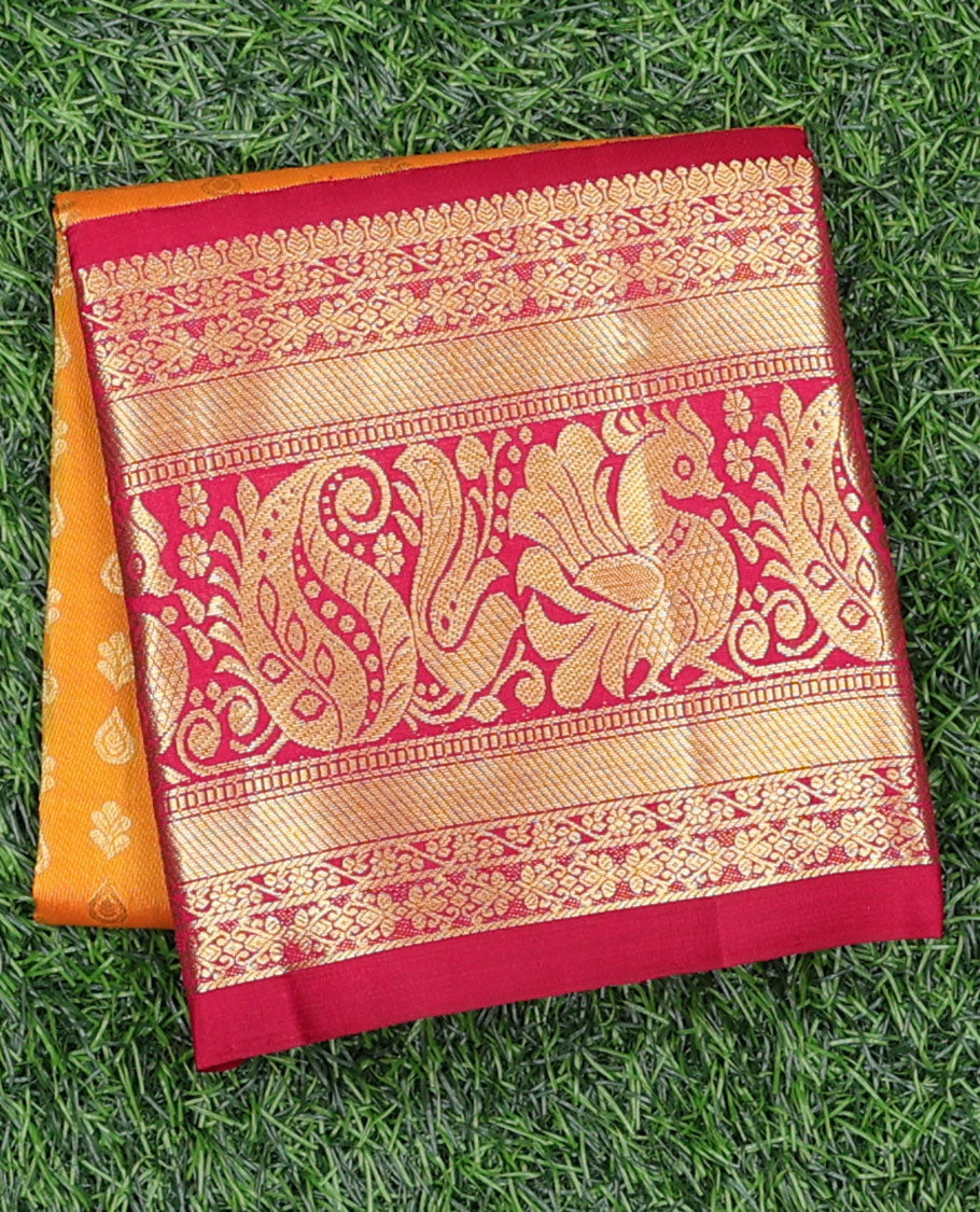 Orange zari buttas navarathna pavadai material, contrast blouse & traditional zari design border