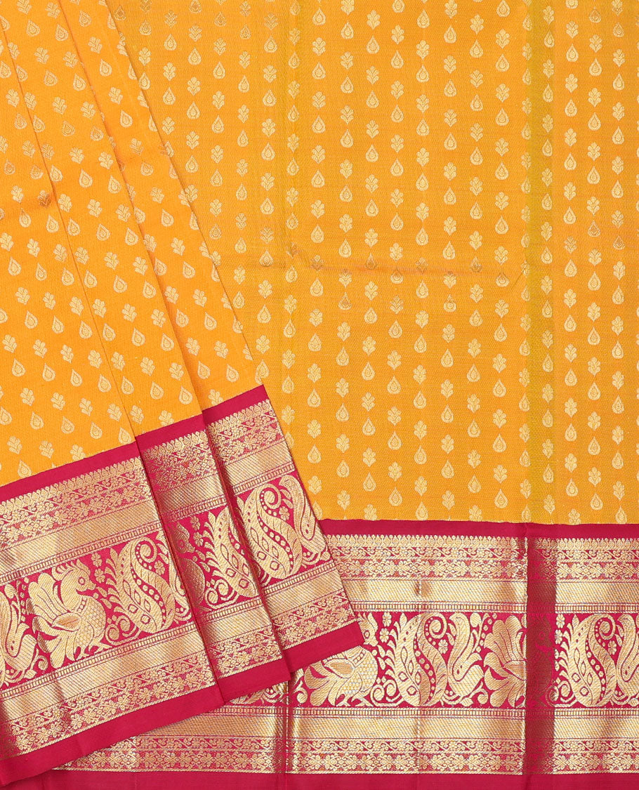 Orange zari buttas navarathna pavadai material, contrast blouse & traditional zari design border