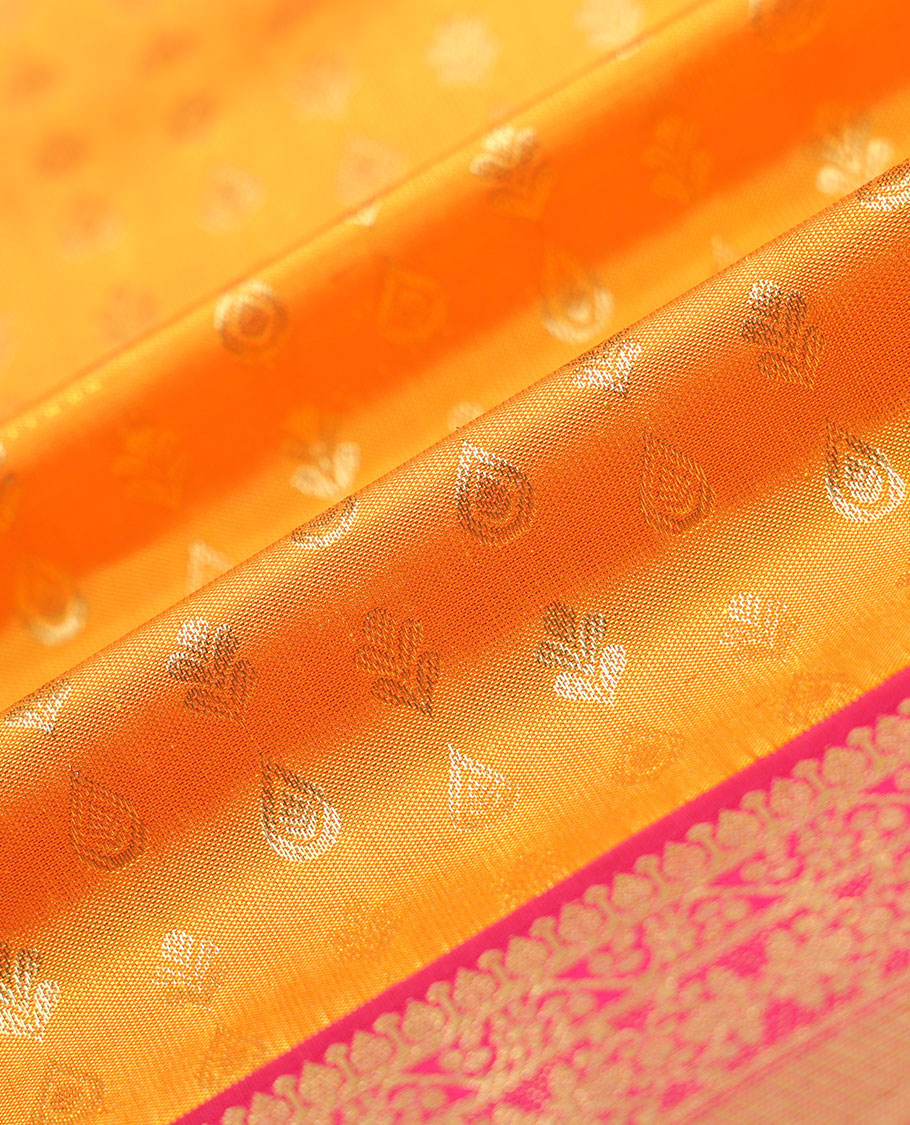 Orange zari buttas navarathna pavadai material, contrast blouse & traditional zari design border