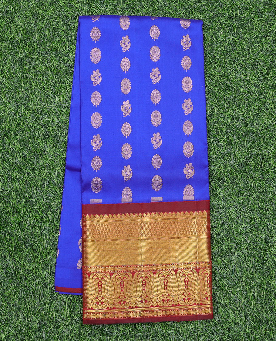 Blue zari buttas navarathna pavadai material, contrast blouse & traditional zari design border