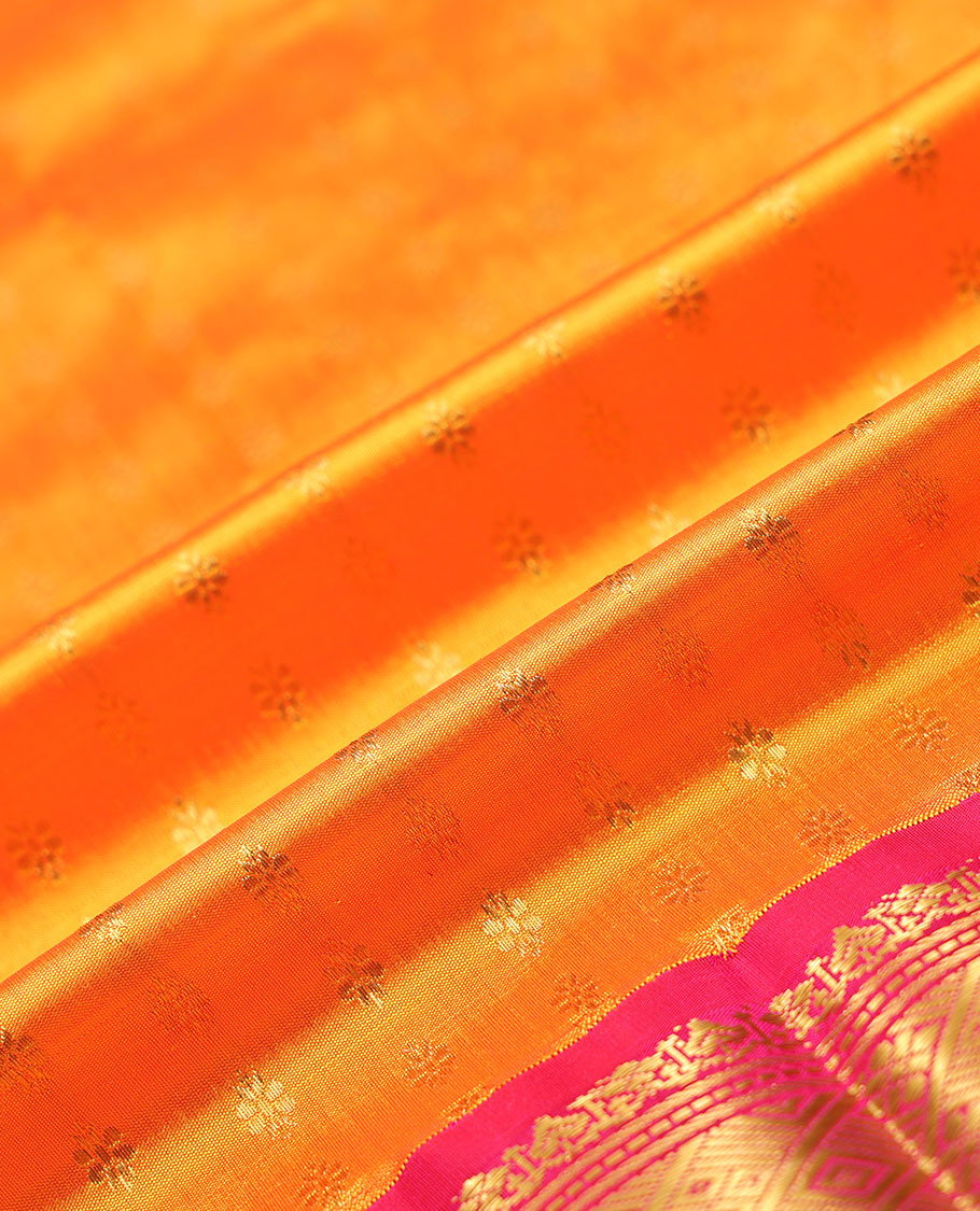 Orange zari buttas navarathna pavadai material, contrast blouse & traditional zari design border