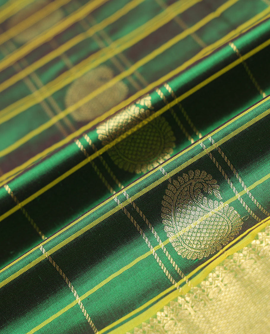 Green checked & paisley buttas navarathna pavadai material, contrast blouse & traditional zari design border