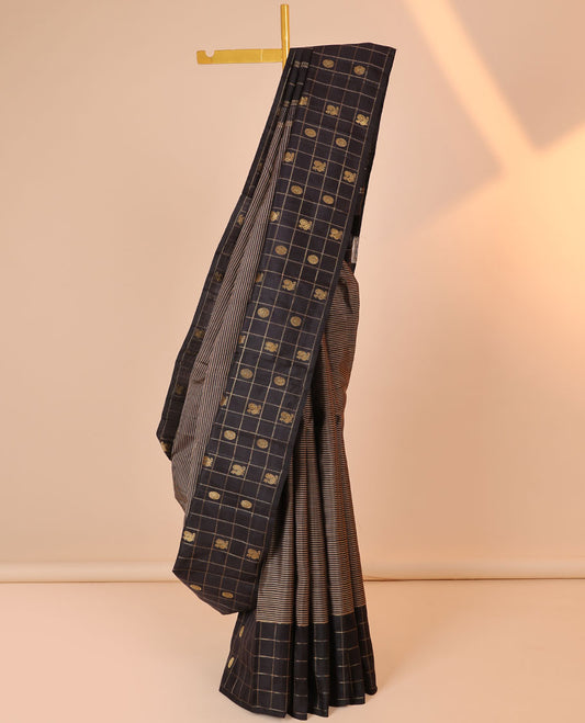 Black striped silk saree, zari checked border of mayil chakram & zari-rich pallu of seppu rekku