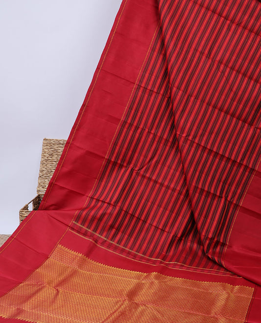 Red striped silk saree with neli & muthu stripes, rettai pettu poun border & pallu of thilakam mokku & jaal designs