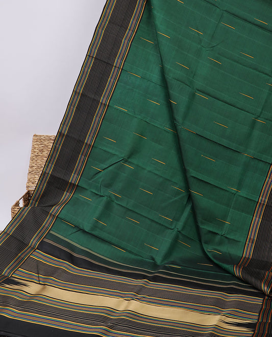 Green malli mokku buttas kancheepuram silksaree, contrast geometric patterns thread border & pallu of stripes & vidarbha