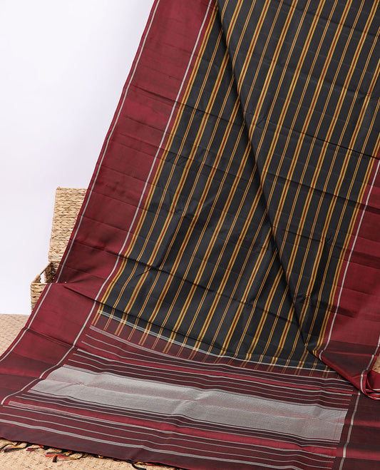 Black striped kancheepuram silksaree, contrast rettai pettu border & pallu of zari designs
