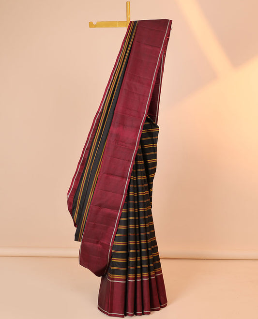 Black striped kancheepuram silksaree, contrast rettai pettu border & pallu of zari designs
