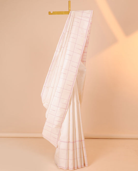 Cream kancheepuram silksaree with malli mokku buttas,malli mokku border & pallu of pillaiyar mokku