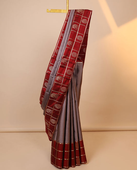 Brown plain body kancheepuram designer silk saree,contrast zari checked border of round mayil & yaanai & intricate pallu