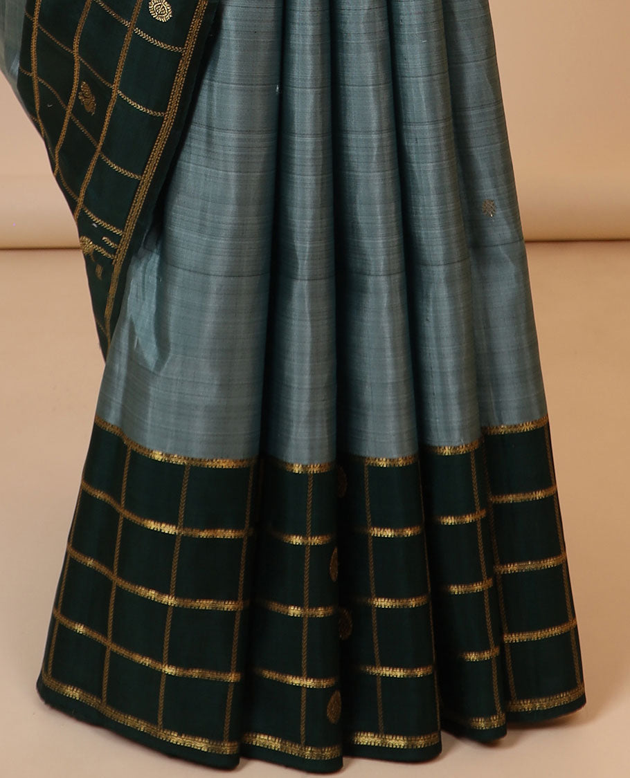 Green zari buttas kancheepuram designer silksaree,contrast mayil chakra motifs enclosed checked border & intricate pallu