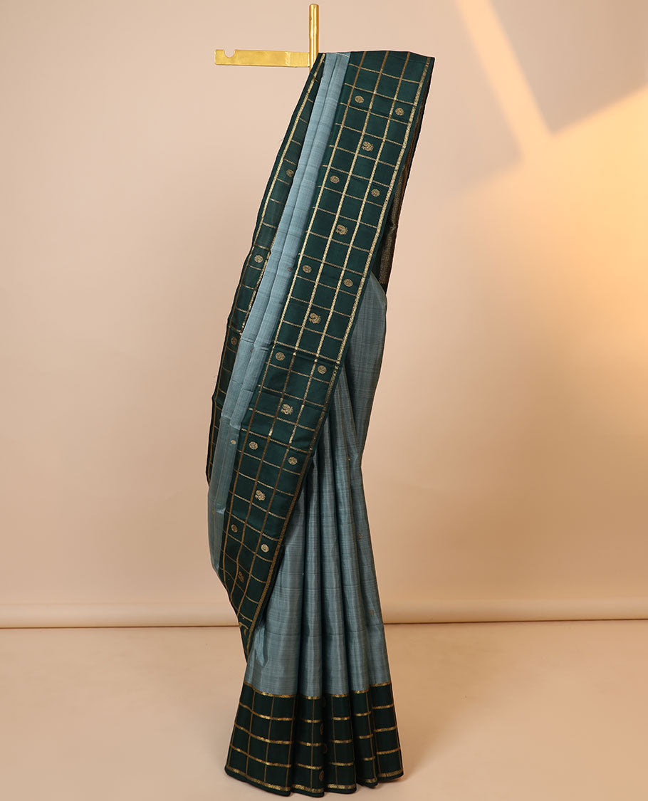 Green zari buttas kancheepuram designer silksaree,contrast mayil chakra motifs enclosed checked border & intricate pallu