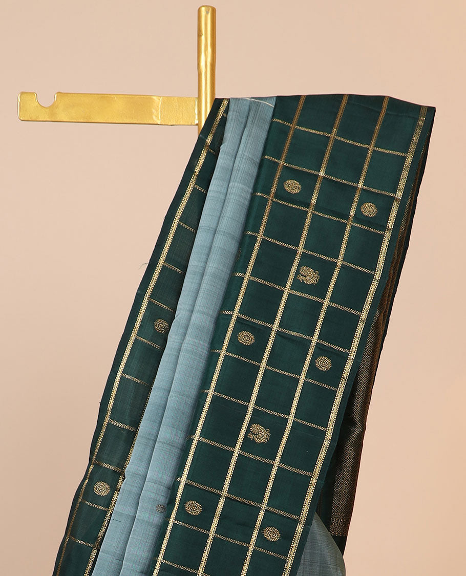 Green zari buttas kancheepuram designer silksaree,contrast mayil chakra motifs enclosed checked border & intricate pallu